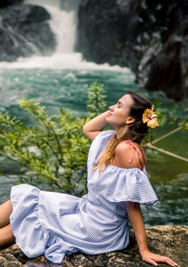 girl-sitting-by-waterfall (1)